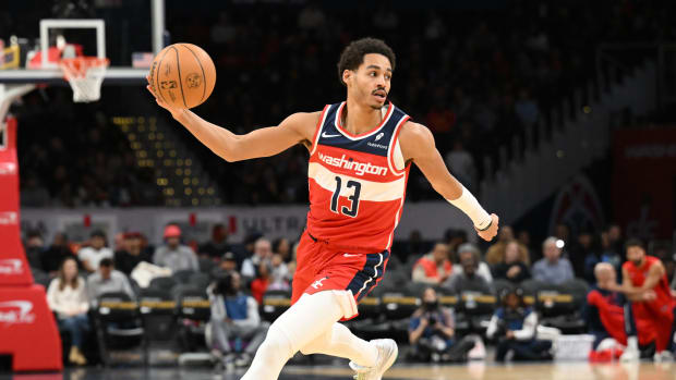 Washington Wizards guard Jordan Poole (13) brings the ball up court against the Atlanta Hawks during the second half at Capital One Arena. 